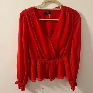 1. State red blouse
